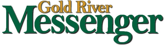 A green and yellow logo for the gold river museum.