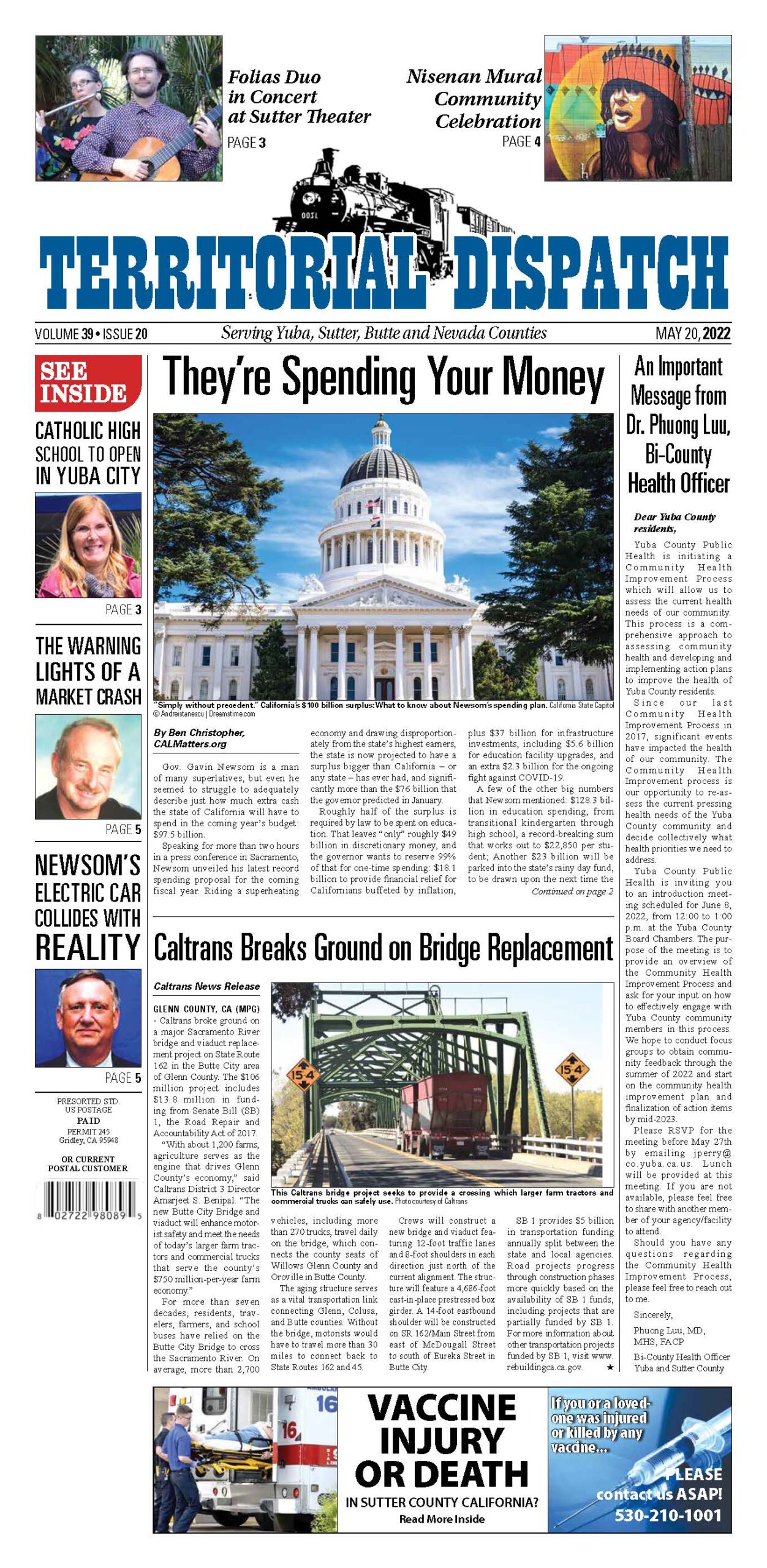 A newspaper with pictures of the capitol building.